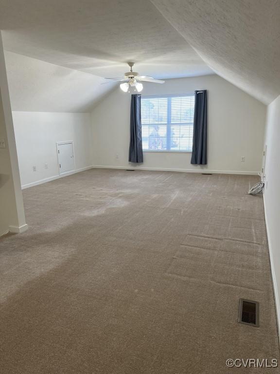 2566 Wanstead Ct, Richmond, VA 23238 - bonus room with a ceiling fan, visible vents, carpet, and vaulted ceiling