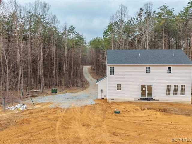 view of property exterior featuring crawl space