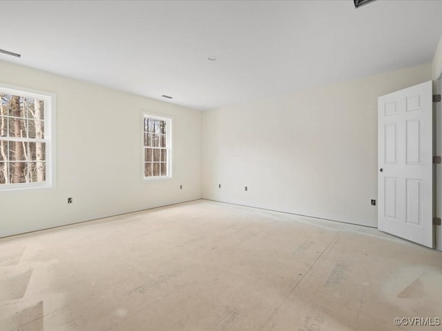 spare room featuring visible vents
