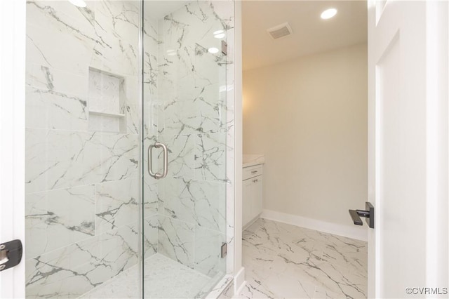 full bathroom featuring a marble finish shower, baseboards, recessed lighting, marble finish floor, and vanity