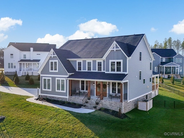 18525 Cove Creek Dr, Moseley, VA 23120 - view of front of home featuring a porch, fence, and a front lawn