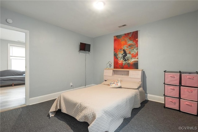 3057 Maury St, Richmond, VA 23224 - bedroom featuring visible vents, baseboards, and carpet floors