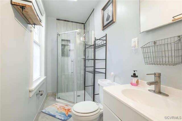 3057 Maury St, Richmond, VA 23224 - bathroom with toilet, a stall shower, and vanity