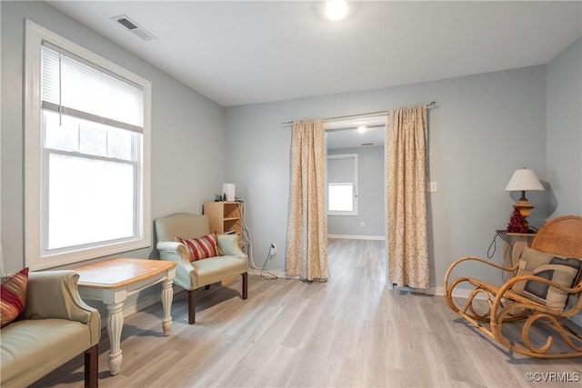 3057 Maury St, Richmond, VA 23224 - sitting room with light wood-style floors, baseboards, and visible vents