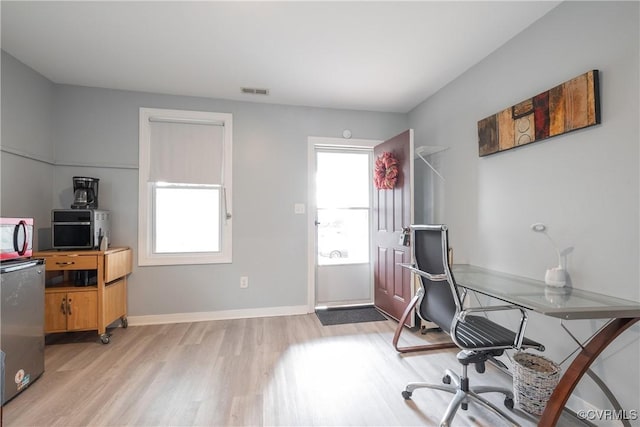3057 Maury St, Richmond, VA 23224 - office featuring visible vents, baseboards, and light wood finished floors