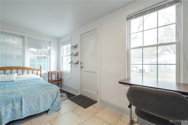 3057 Maury St, Richmond, VA 23224 - bedroom featuring light tile patterned floors and baseboards