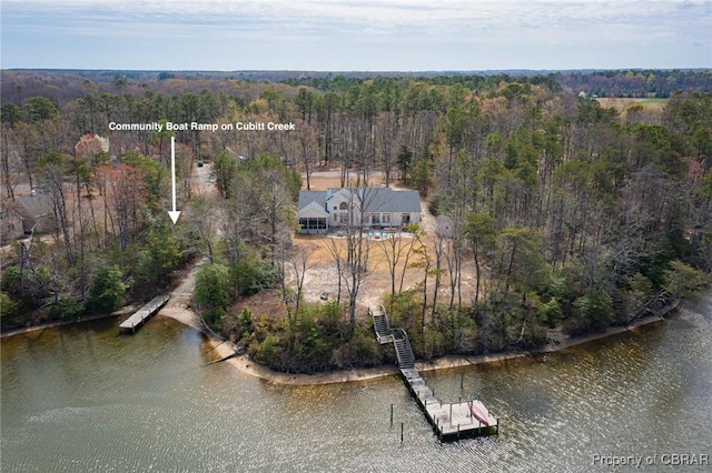 65 Potomac Way Ln, Heathsville, VA 22473 - view of subject property featuring a heavily wooded area and a nearby body of water