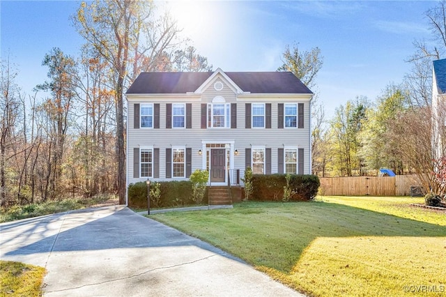 15116 Alderwood Turn, Chester, VA 23831 - colonial-style house with driveway, a front yard, and fence