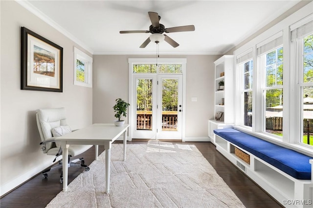 office space featuring ceiling fan, baseboards, dark wood-style floors, and ornamental molding