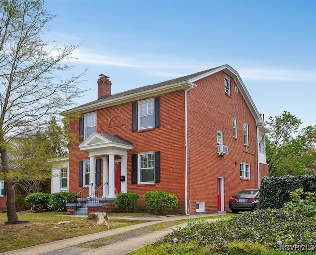 2407 Dumbarton Rd, Henrico, VA 23228 - view of front of house with a chimney and brick siding