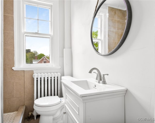 2407 Dumbarton Rd, Henrico, VA 23228 - full bathroom featuring radiator heating unit and vanity