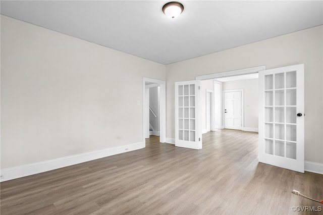 2407 Dumbarton Rd, Henrico, VA 23228 - spare room featuring french doors and wood finished floors