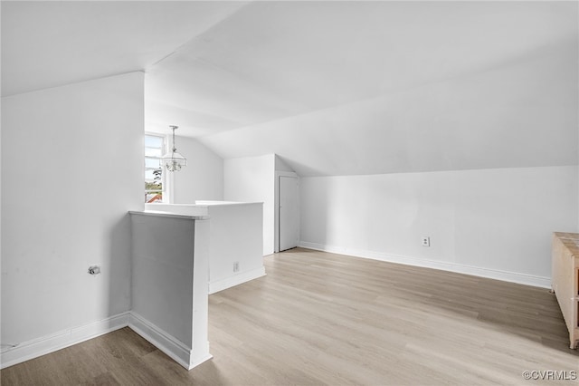 2407 Dumbarton Rd, Henrico, VA 23228 - bonus room featuring vaulted ceiling, wood finished floors, and a chandelier