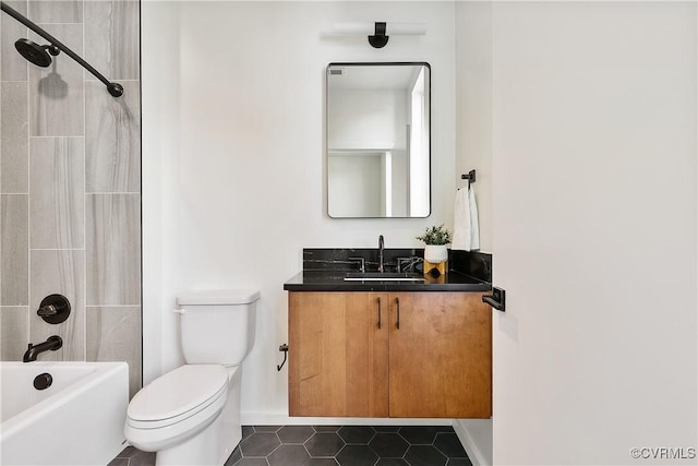 bathroom featuring tile patterned flooring, shower / bathtub combination, toilet, vanity, and baseboards