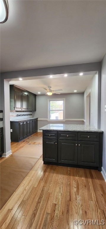 410 N Daisy Ave, Henrico, VA 23075 - kitchen with light wood finished floors, light stone countertops, a ceiling fan, recessed lighting, and baseboards