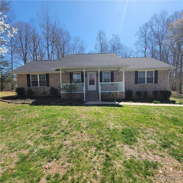 19164 Woodsons Mill Rd, Beaverdam, VA 23015 - ranch-style house with covered porch, brick siding, and a front lawn