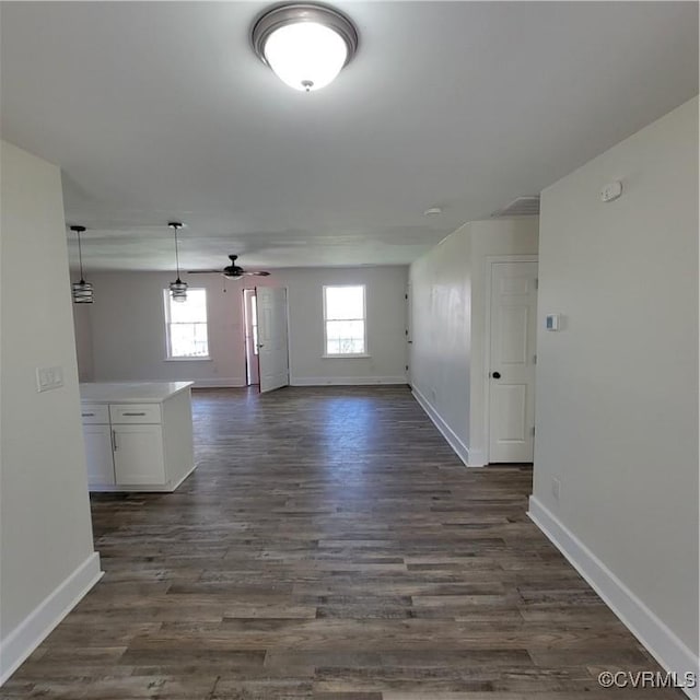 19164 Woodsons Mill Rd, Beaverdam, VA 23015 - interior space with baseboards, dark wood-style flooring, and a ceiling fan