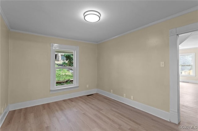 1413 First Rock Rd, Prospect, VA 23960 - spare room with crown molding, a healthy amount of sunlight, and wood finished floors