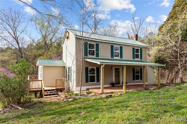 1413 First Rock Rd, Prospect, VA 23960 - view of front of property featuring a chimney, metal roof, and a front yard