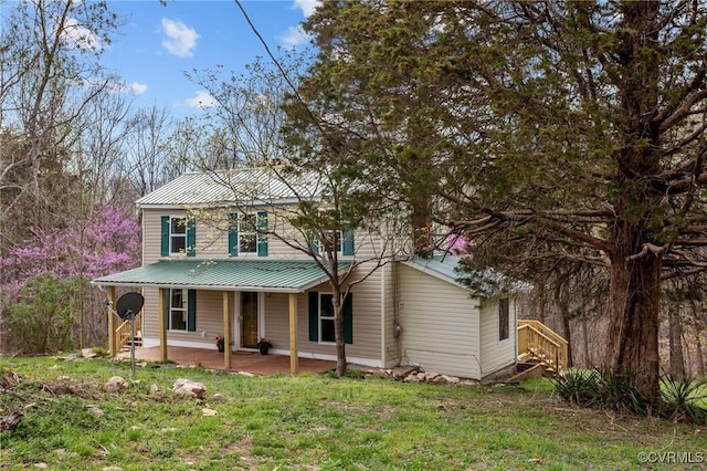 1413 First Rock Rd, Prospect, VA 23960 - country-style home with a front lawn and metal roof