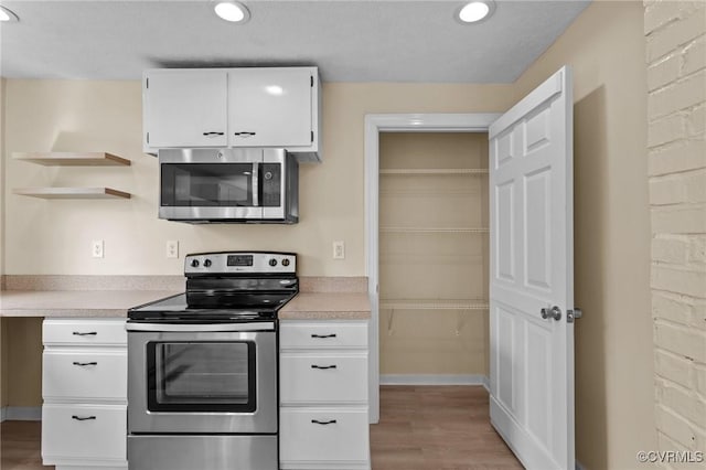 1413 First Rock Rd, Prospect, VA 23960 - kitchen with light countertops, recessed lighting, and appliances with stainless steel finishes