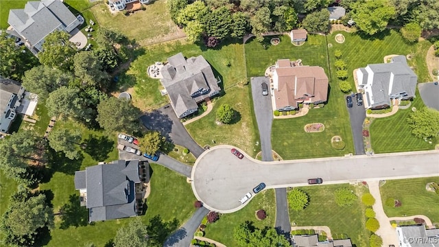 birds eye view of property with a residential view