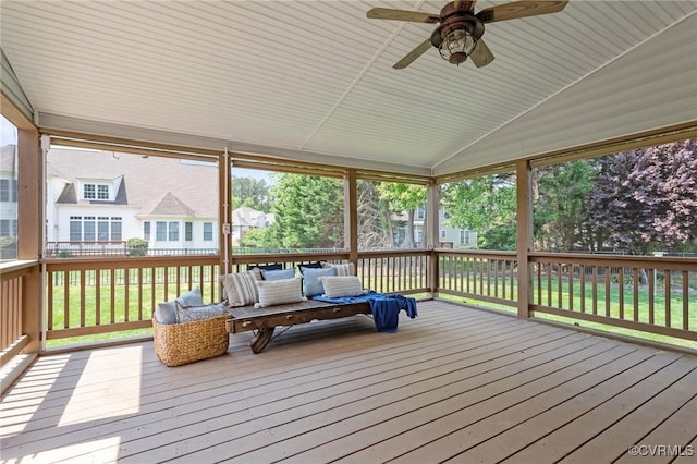 deck featuring ceiling fan and outdoor lounge area