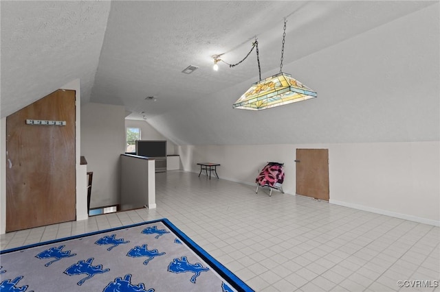 10011 Loblolly Ter, Amelia, VA 23002 - bonus room featuring vaulted ceiling, a textured ceiling, and baseboards