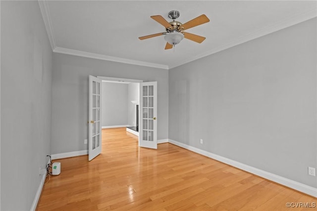 11421 Regal Ter, Providence Forge, VA 23140 - empty room with french doors, wood finished floors, baseboards, ornamental molding, and ceiling fan