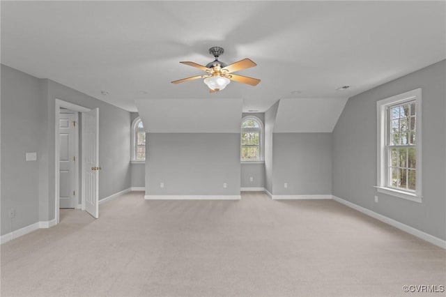 11421 Regal Ter, Providence Forge, VA 23140 - additional living space with a ceiling fan, light carpet, plenty of natural light, vaulted ceiling, and baseboards