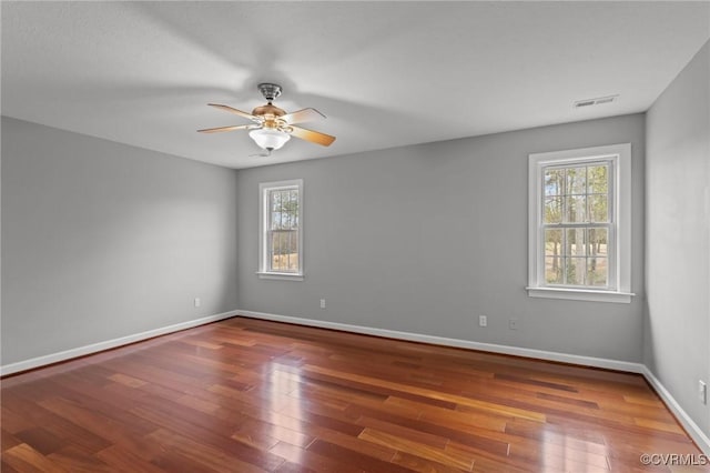 11421 Regal Ter, Providence Forge, VA 23140 - spare room featuring plenty of natural light, ceiling fan, wood finished floors, and baseboards