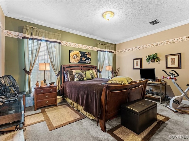 carpeted bedroom with visible vents, ornamental molding, and a textured ceiling