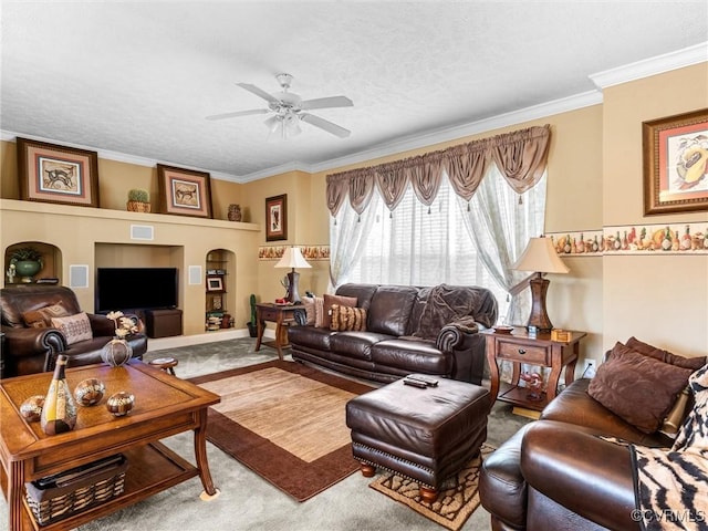 carpeted living room with crown molding, a textured ceiling, and ceiling fan