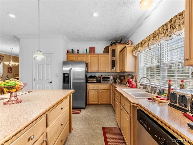 kitchen with glass insert cabinets, light countertops, a sink, and appliances with stainless steel finishes