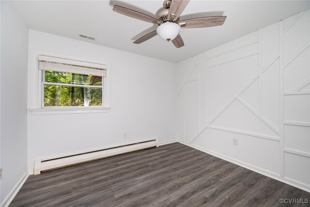 unfurnished room with ceiling fan, a baseboard heating unit, visible vents, and dark wood-type flooring