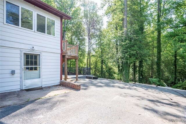 exterior space featuring a patio and a deck
