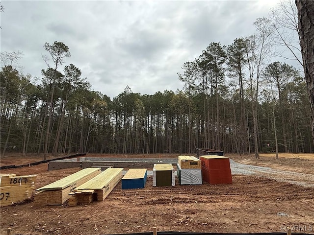 59 Jamestown Ln, Bracey, VA 23919 - view of community featuring a view of trees