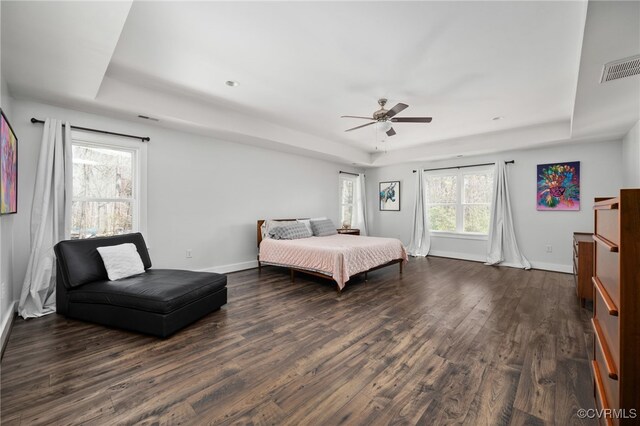 13201 Brooke Ridge Ln, Spotsylvania, VA 22551 - bedroom featuring a raised ceiling, dark wood-style flooring, and ceiling fan