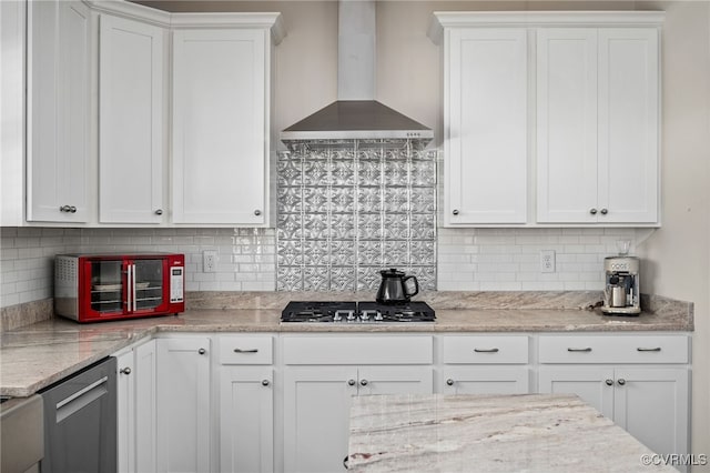 13201 Brooke Ridge Ln, Spotsylvania, VA 22551 - kitchen featuring wall chimney exhaust hood, appliances with stainless steel finishes, white cabinetry, decorative backsplash, and light stone counters