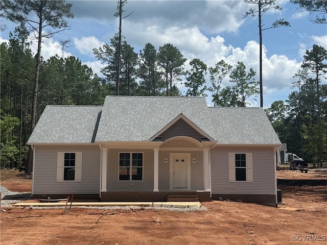 162 Tradewind Xing, Bracey, VA 23919 - view of front of property with roof with shingles and central AC unit