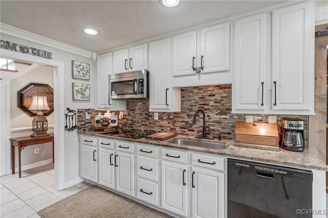 kitchen featuring white cabinets, a sink, and black appliances