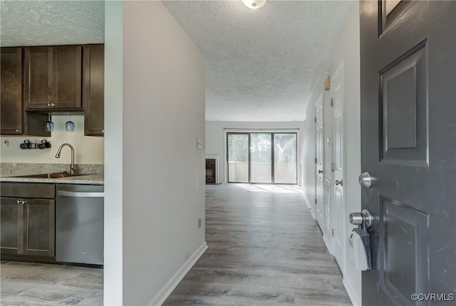 12255 Shore View Dr, Henrico, VA 23233 - hallway with a textured ceiling and light wood-style floors