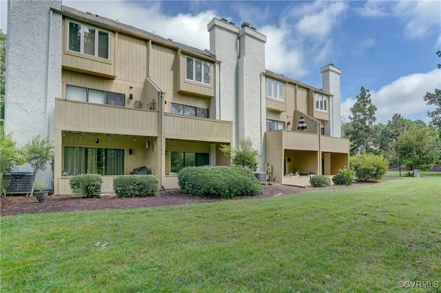 12255 Shore View Dr, Henrico, VA 23233 - rear view of property featuring a chimney and a lawn