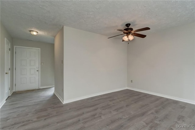 12255 Shore View Dr, Henrico, VA 23233 - spare room with wood finished floors, a textured ceiling, and ceiling fan