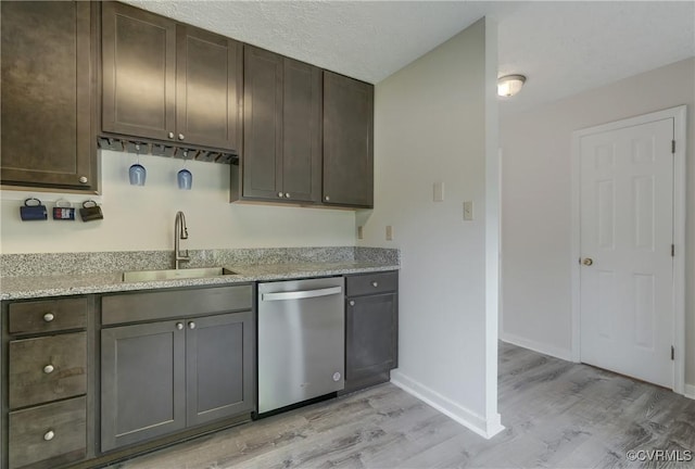 12255 Shore View Dr, Henrico, VA 23233 - kitchen with dishwasher, light wood-style flooring, and dark brown cabinetry