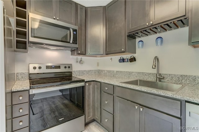 12255 Shore View Dr, Henrico, VA 23233 - kitchen with appliances with stainless steel finishes and light stone countertops