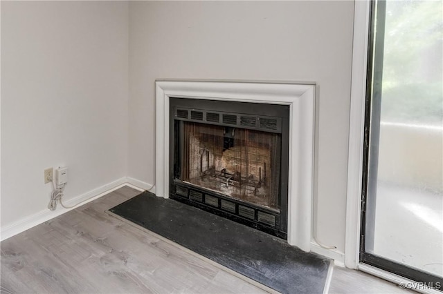 12255 Shore View Dr, Henrico, VA 23233 - detailed view of a fireplace and wood finished floors