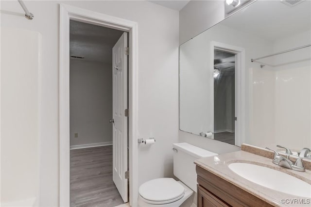 12255 Shore View Dr, Henrico, VA 23233 - full bathroom featuring vanity, a shower, and wood finished floors