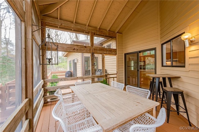 941 Wilton Coves Dr, Hartfield, VA 23071 - sunroom with lofted ceiling, plenty of natural light, and outdoor dining area