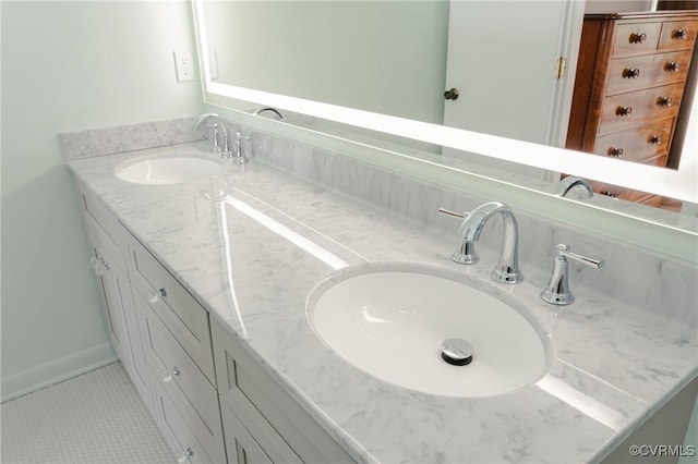941 Wilton Coves Dr, Hartfield, VA 23071 - bathroom featuring double vanity and tile patterned floors